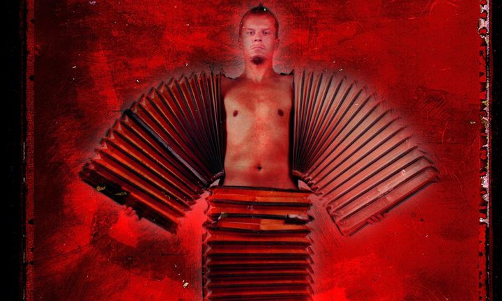 Kimmo Pohjonen communicates with visuality in his accordion solo; the music creates layers of image. Image: Tuomo Manninen.