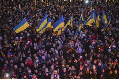 Senaatintorilla järjestettiin Valoa Ukrainaan -tapahtuma sodan syttymisen vuosipäivänä 24.2.2023. Kuva: Kimmo Brandt