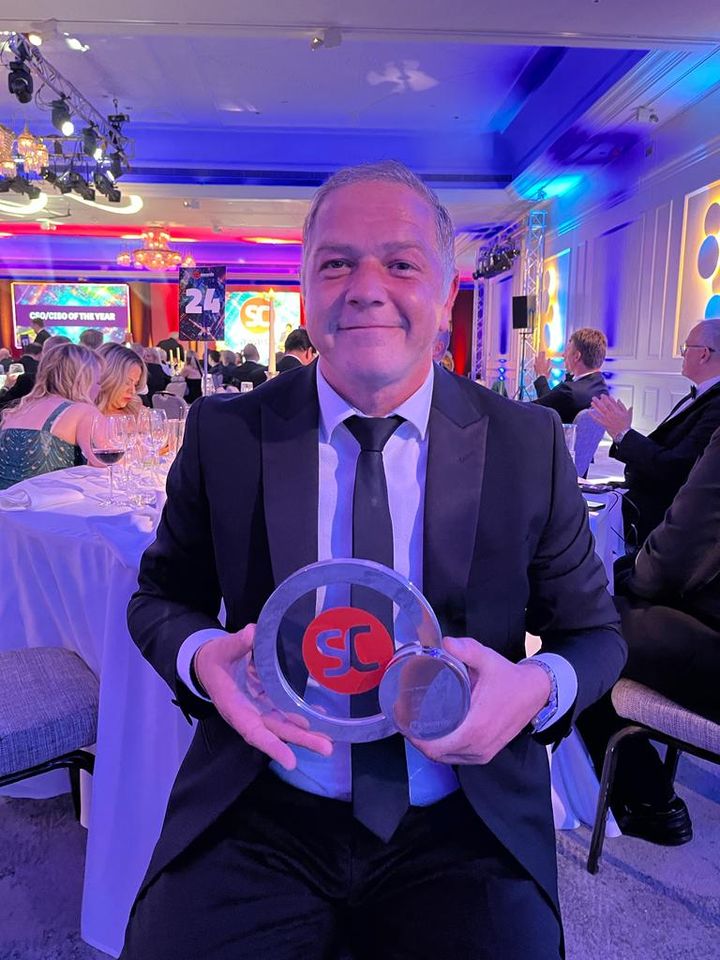 Christophe Strauven, Vice President Europe TXOne Networks, at "SC Award Europe 2023" event with TXOne's award as "Newcomer of the Year".