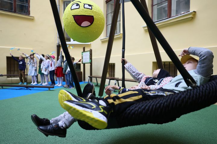 Local kids enjoying the opening of the new playground at Lviv Public School No 62 on June 7, 2023.