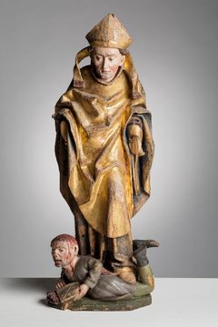 Akaan kirkosta oleva 1500-luvulla valmistettu puuveistos kuvaa Piispa Henrikiä ja Lallia. Keskiaikainen yhdestä puusta, luultavasti lehmuksesta, veistetty noin 85-senttinen veistos tulee esille uudistuvaan perusnäyttelyyn. Kuva: Museovirasto