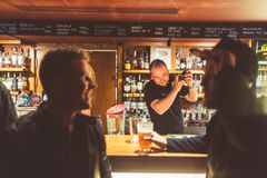 A beer expert at work at Olutravintola Konttori.