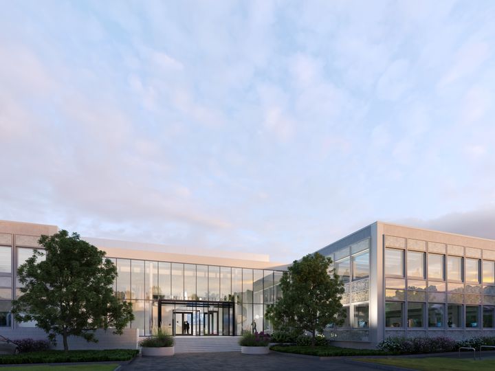 An illustration of the glass facade of a grey two-storey building. The stairs lead to the entrance with the text Niittyportti 4 above it. There are trees and flowers in front of the building.