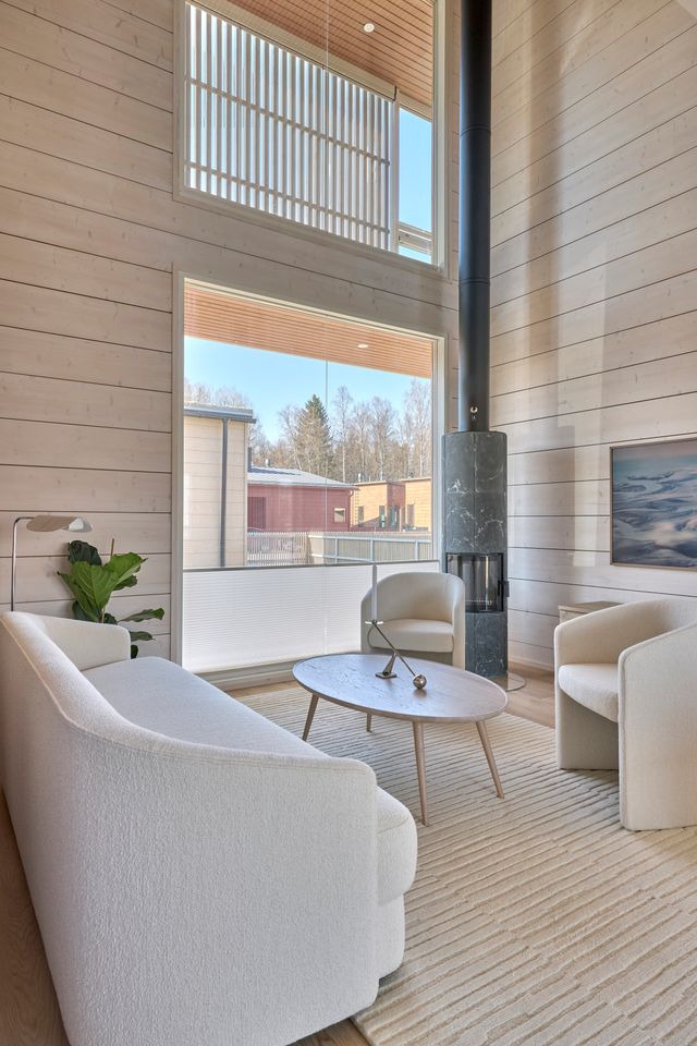 Finnlamelli Villa Musica olohuone ja takka