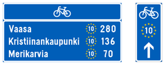 Esimerkit reitille tulevista etäisyystauluista ja suunnistustauluista.
