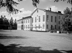 Kuva: Arkkitehti Jalmari Peltosen suunnittelema rakennus valmistui vuonna 1930.
Koulun toiminta päättyi rakennuksessa vuonna 2015. Konstantin Grünberg / Helsingin kaupunginmuseo.