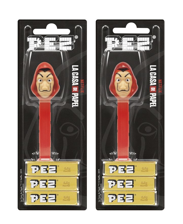 The PEZ Money Heist dispensers – featuring the legendary Dali mask. 
Photo: ©&TM by PEZ AG. La Casa de Papel: TM/© Netflix