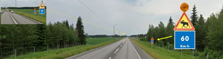Aktiivinen hirvivaroitusjärjestelmä ennen riista-aidan aukkokohtaa. Keltainen varoitusvilkku ja valaistava Hirviä varoitusliikennemerkki.