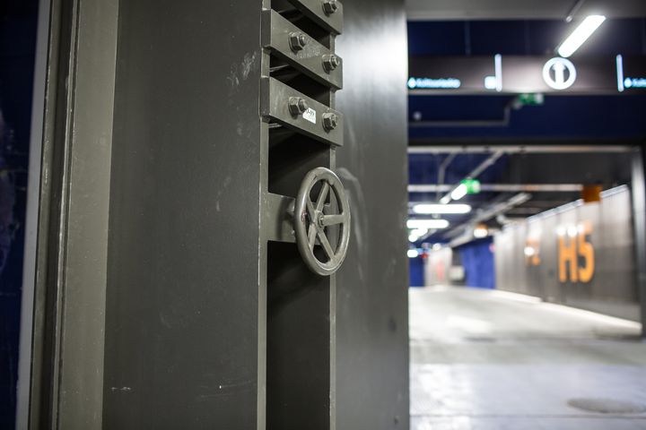 Reinforced concrete dual-purpose underground parking garage and mass shelter.