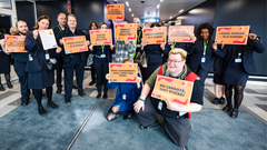JHL members at the airport with strike signs on 5 October 2023.