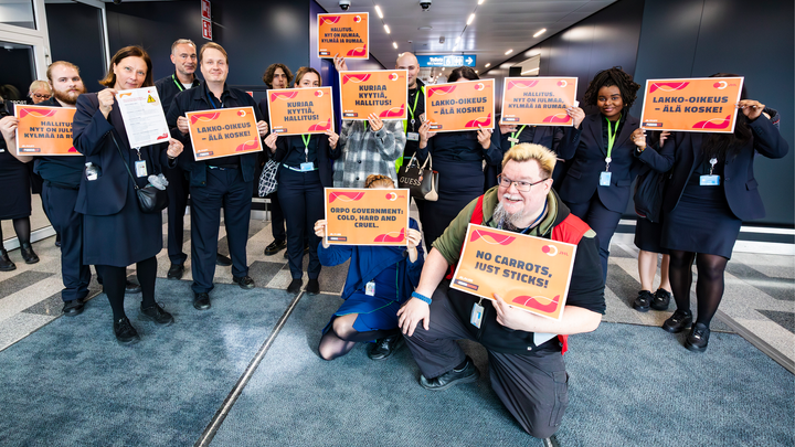 JHL members at the airport with strike signs on 5 October 2023.