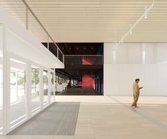 Havainnekuva Espoon kulttuurikeskuksen galleriasta avautuvasta näkymästä teatterin aulaan, jossa näkyvät avarat tilat ja moderni sisustus.