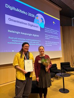 Jon Karvinen and Marja Säikkä (City of Helsinki) receive the Digitukiteko 2026 award.