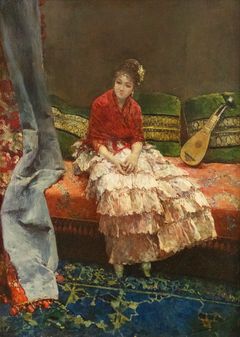 A woman is sitting on a bench in a frilly skirt.