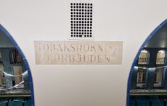 Seinäpinnan alta löytynyttä vanhaa tekstiä.