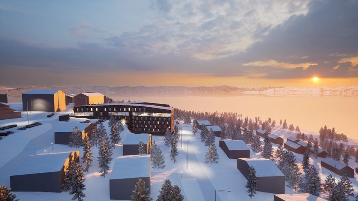 Talvinen maisema auringonlaskussa: lunta peittäviä rakennuksia ja havupuita.