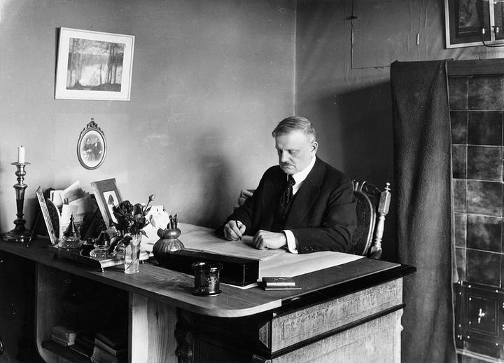 Jean Sibelius at his desk at his study in Ainola.