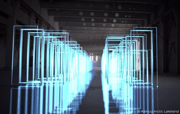 Valojen muodostama futuristinen installaatio pimeässä tilassa.