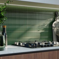 Vihreä Arrow-sormilaatta keittiön välitilassa.