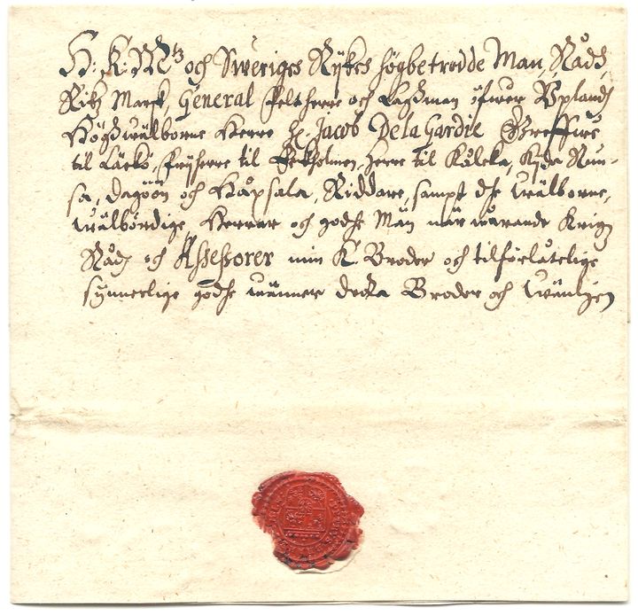 Vanha kirje jossa vanhaa käsialaa ja punainen sinetti.