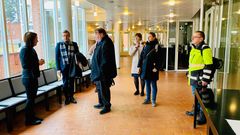 Olari parish workers are discussing environmental work with Hannu Salminen.