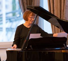 Annikka Konttori-Gustafsson plays the piano.