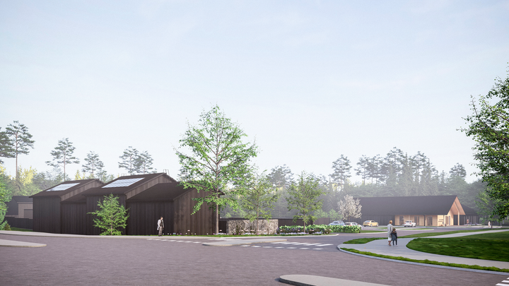 En arkitektritning med svartgrå byggnader och grönska.