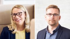 Kaksi henkilöä katsoo kameraan, taustalla neutraali sisustus.