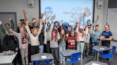 Koululaiset energisellä oppitunnilla