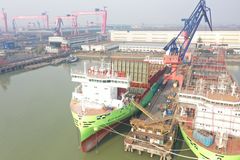 X-Press Feeders first dual-fuel ship Eco Maestro in Shanghai port. Vessel is built and is now being equipped.