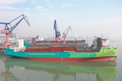 Picture shows X-Press Feeders first dual-fuel ship Eco Maestro in Shanghai port. Vessel is built and is now being equipped.