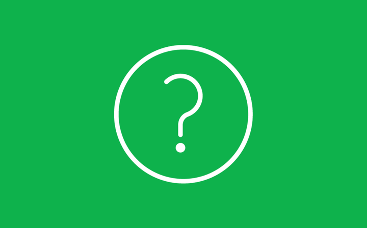 Photo of a green background and a circled questionmark in the middle.