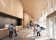 Visuaalinen kuvaus museon aulasta: tila on avara, valoisa ja muistuttaa olohuonetta.