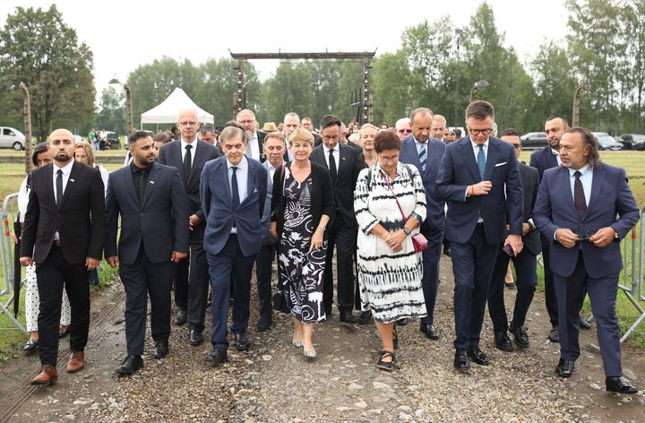 On the way to the commemorative ceremony in Auschwitz-Birkenau: Istvan Gyöngyösi, Member of the Hungarian Parliament; Krisztian Köszegi, Deputy President of the Hungarian Parliament; Michael Brand, Federal Government Commissioner against Anti-Gypsyism and for the Life of Sinti and Roma in Germany; Romani Rose, Chairman of the Central Council of German Sinti and Roma; Isabelle Berro-Amadei, President of the Committee of Ministers of the Council of Europe and Minister of Foreign Affairs and Cooperation of Monaco; Petra Bayr, President of the Parliamentary Assembly of the Council of Europe; Szymon Hołownia (Deputy Marshal of the Sejm of the Republic of Poland), Roman Kwiatkowski, President of the Association of Roma in Poland (from left).