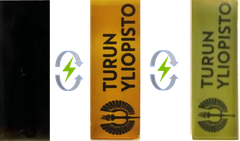 kuvassa kolme eri väristä palkkia, joissa näkyy Turun yliopiston logo. Ne ovat valokuvia tutkijan kehittämistä poryfiinikalvoista, jotka vaihtavat väriä sähkövirran vaikutuksesta