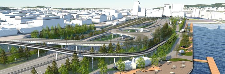 Aluevaraussuunnitelman havainnekuva Rantaväylästä Jyväskylässä, näkymä etelän suunnasta kohti satama-aluetta. Ratkaisu on suuntaa antava ja tarkentuu jatkosuunnittelussa. Taustalla on esitetty Jyväskylän kaupungin visio Ratapihan Siltakortteleista.