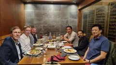 Sitting in the middle on both sides of the table are DHI CEO Ujjwal Deep Dahal and Avant Wood Oy Chairman of the Board Pekka Ritvanen.